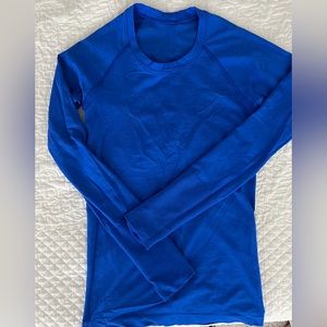 Lululemon bright royal blue long sleeve top- only worn a few times. Very comfy!